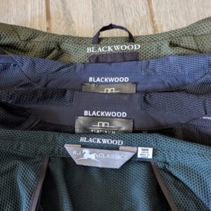 Four show jackets with name labels